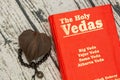 Maski,Karnataka,India - March 13,2019 :The Holy Vedas on wooden textured background