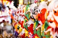 Masks simulating make-up in an Angkor show, hanging on display for customers to buy as they wish