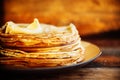 Pancakes with banana, nuts and honey. Traditional Russian cuisine. Maslenitsa. Dessert.