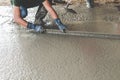 Mason building a screed coat cement Royalty Free Stock Photo