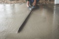 Mason building a screed coat cement Royalty Free Stock Photo