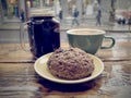 Mason Jar Coffee Mug and Classic Ceramic Coffee Cup on a Window Counter