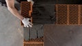 Mason making wall with mortar and bricks. Stock footage. Close up of industrial worker hands building a wall of new Royalty Free Stock Photo