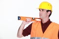 Mason with spirit level Royalty Free Stock Photo