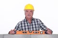 Mason with spirit level Royalty Free Stock Photo