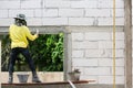 Mason using trowel for plastering the concrete to build wall, Co Royalty Free Stock Photo