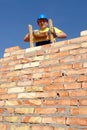 Mason on wooden ladder Royalty Free Stock Photo