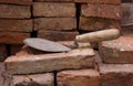 Masonary trowel on bricks Royalty Free Stock Photo