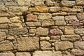 Masonry construction of medieval fortress wall made of limestone Royalty Free Stock Photo