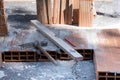 Various masonry and brickwork tools being used on a construction site