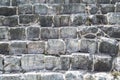 The masonry of the large stone. The pyramid of Kukulkan in Chichen Itza. Mayan pyramids, sky, clouds. Yucatan. Mexico Royalty Free Stock Photo