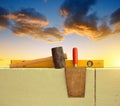 Masonry tools on brick wall Royalty Free Stock Photo