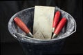 Masonry tools in a bucket Royalty Free Stock Photo