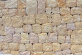 Masonry wall of stones with irregular pattern texture background Royalty Free Stock Photo