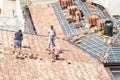 Masons to work on the roof for laying tiles