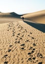 Men walk in Maspalomas Dunes
