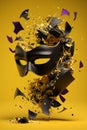 Masquerade black and gold carnival mask with confetti splash,