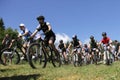 Mass bikers cycling in the mountain Royalty Free Stock Photo