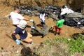 Mass grave for victims of typhoon Haiyan in Philippines