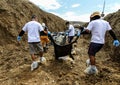 Mass grave for victims of typhoon Haiyan in Philippines