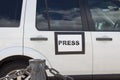 Mass media auto with sign Press in Kyiv, Ukraine. Global journalism. Documentary footage in Ukraine. News vehicle on the street. Royalty Free Stock Photo