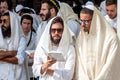 Mass prayer. Hasids pilgrims in traditional clothes. Tallith - jewish prayer shawl. Rosh Hashanah, Jewish New Year.