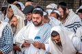 Mass prayer. Hasids pilgrims in traditional clothes. Tallith - jewish prayer shawl. Rosh Hashanah, Jewish New Year.
