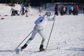 Mass ski race ski Track of The kid is fixed on the back of the skier