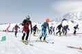 Mass start race, ski mountaineers climb on skis on mountain. Team Race ski mountaineering. Kamchatka, Russia