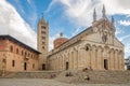 View at the Cathedral of Saint Cerbonius with Bell tower at the Garibaldi place in Massa Marittima - Italy Royalty Free Stock Photo