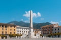 Massa, Tuscany. Piazza Aranci oranges square, the city`s main square, characterized by a double row of orange trees, the obelis