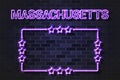 Massachusetts US State glowing violet neon letters and starred frame on a black brick wall Royalty Free Stock Photo