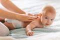 Massage for the baby from the mother`s hands