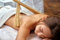 Massage with bamboo sticks