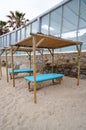 Massage bed at the beach of Mykonos , Greece. Royalty Free Stock Photo