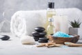 Massage. Composition with candles, spa stones and salt on concrete background. Spa and wellness setting ready for beauty treatment Royalty Free Stock Photo