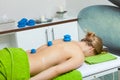 Massage with cupping glass in beautician Royalty Free Stock Photo