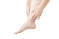 Massage of female feet isolated on white background Royalty Free Stock Photo