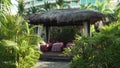 Massage gazebo in the tropical garden on site Resort Intime Sanya 5 unfocused time lapse stock footage video