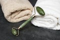 Massage kit, jade roller and gouache scraper. Natural jade. Facial massager. jade massage roller Royalty Free Stock Photo