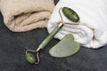 Massage kit, jade roller and gouache scraper. Natural jade. Facial massager Royalty Free Stock Photo