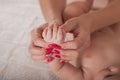 Massage the newborn close-up and copy space. Selective focus. Baby feet massage