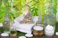 Massage oils with a Buddha figurine