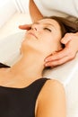 Massage and osteopathy to a woman Royalty Free Stock Photo