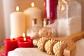Massage roller and candles Royalty Free Stock Photo