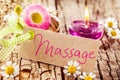 Massage sign on tree bark with decorations Royalty Free Stock Photo