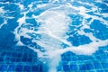 Massage and spa swimming pool with bubbles blue water Royalty Free Stock Photo