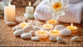 Massage stones, spa concept candles fire wellness relax care background Royalty Free Stock Photo