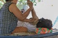 Massage style Thai old culture by hands and foot knead on body for relax muscle