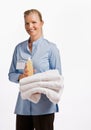 Massage therapist holding oil and towels Royalty Free Stock Photo